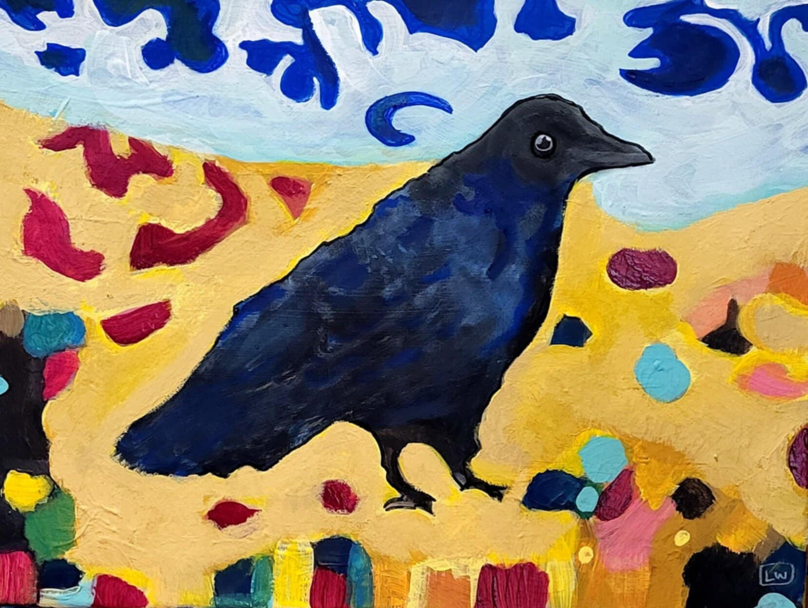 crow magnum is a 12"x16" acrylic painting on canvas of a black crow with blue highlights on against a wild white and blue sky, standing on a yellow and gold beach with multi-coloured rocks scattered. Impressionist style.