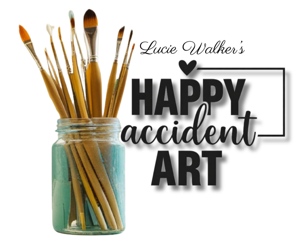 clear jar of paint brushes